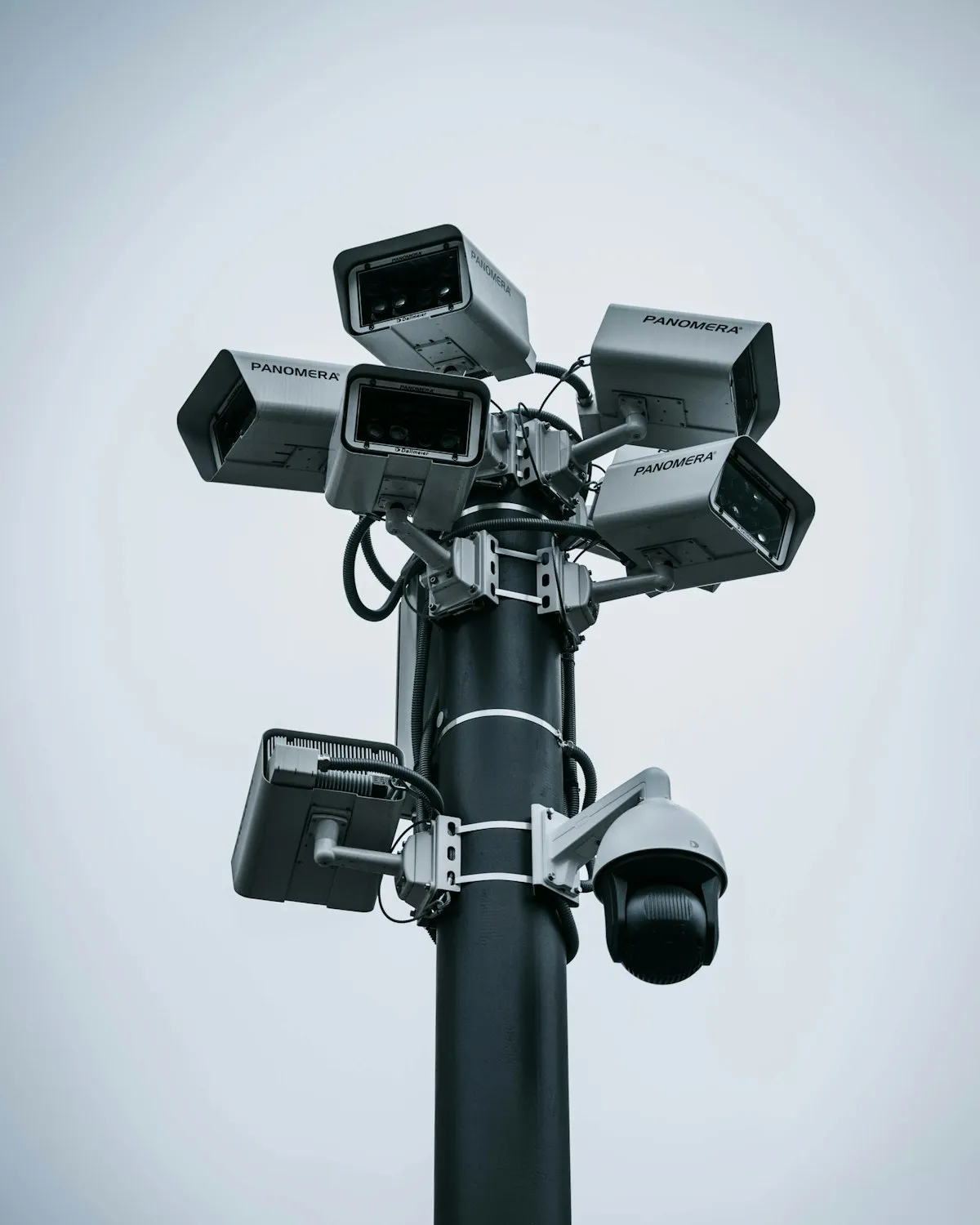 Tall pole fitted with multiple surveillance cameras